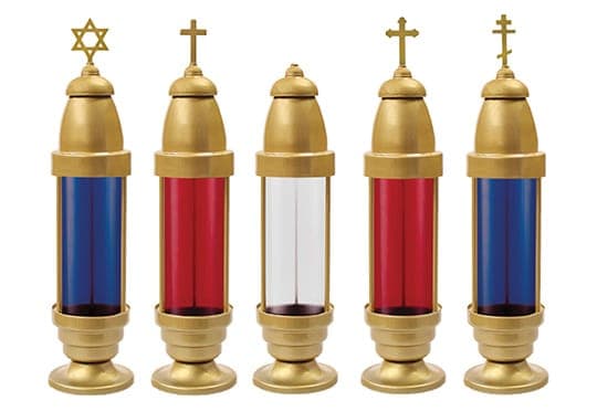 Five brass memorial lights in red, blue, and clear, each topped with a faith emblem