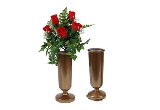 Two bronze replacement cemetery vases, one arranged with red silk roses