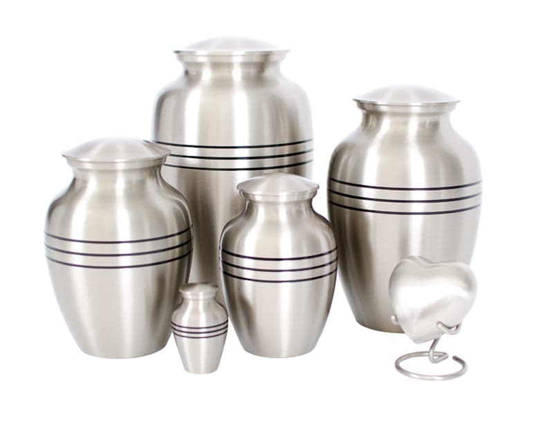 A family of classic brushed pewter urns with matching keepsake and heart urns